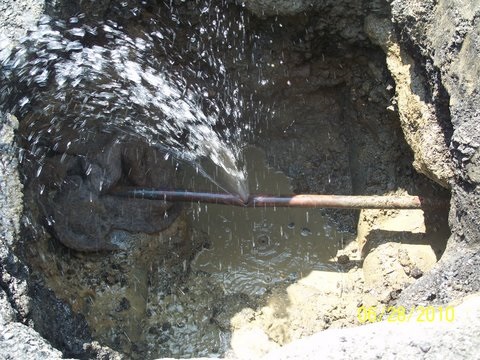fixing a water leak in a pipe