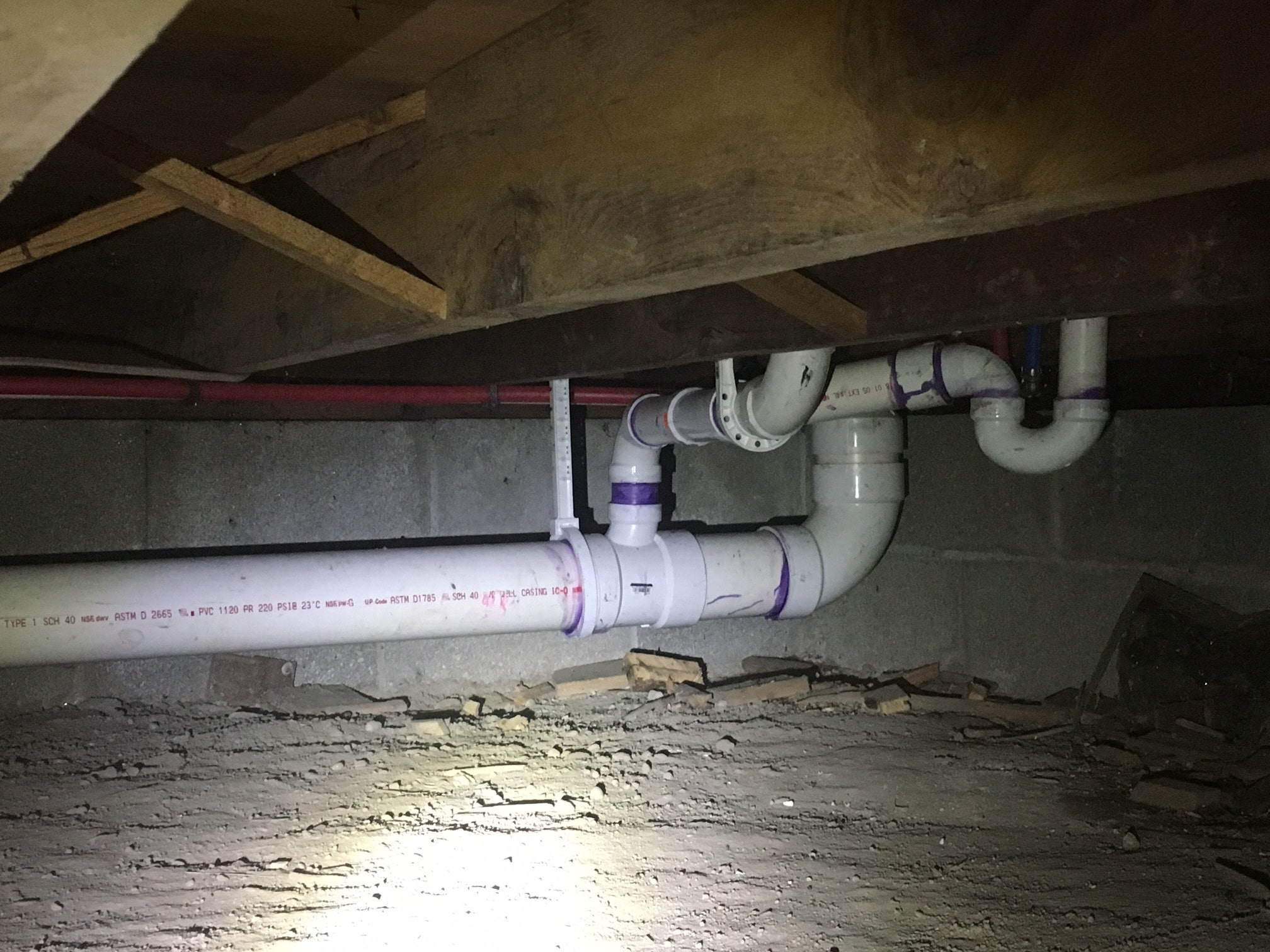 water pipes under a house