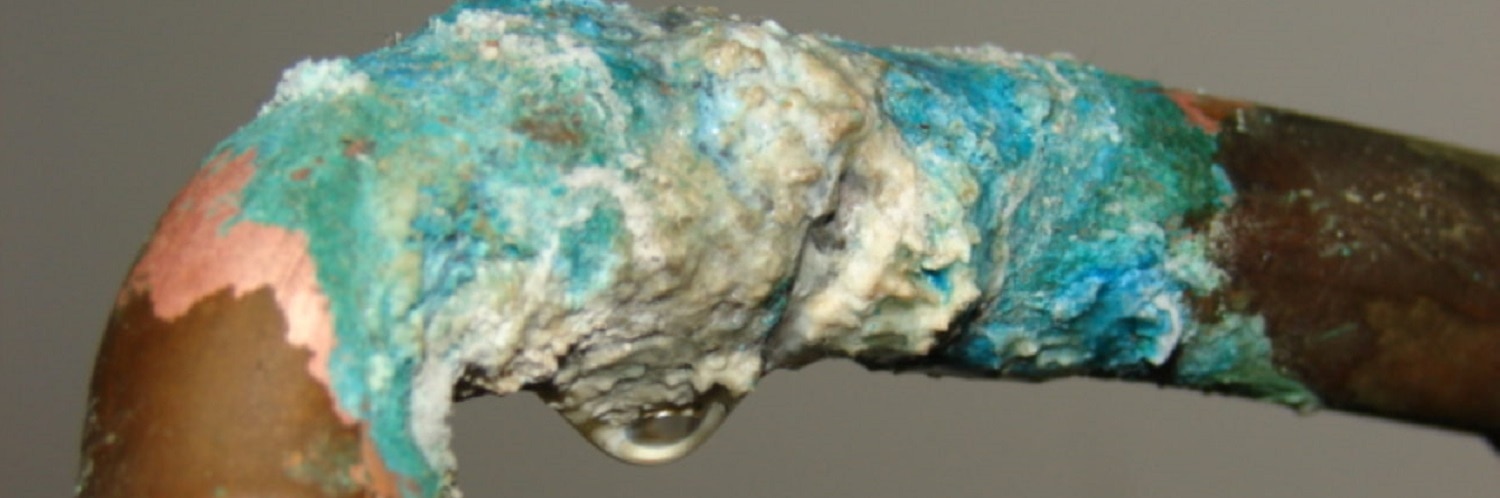 a corroded copper pipe joint